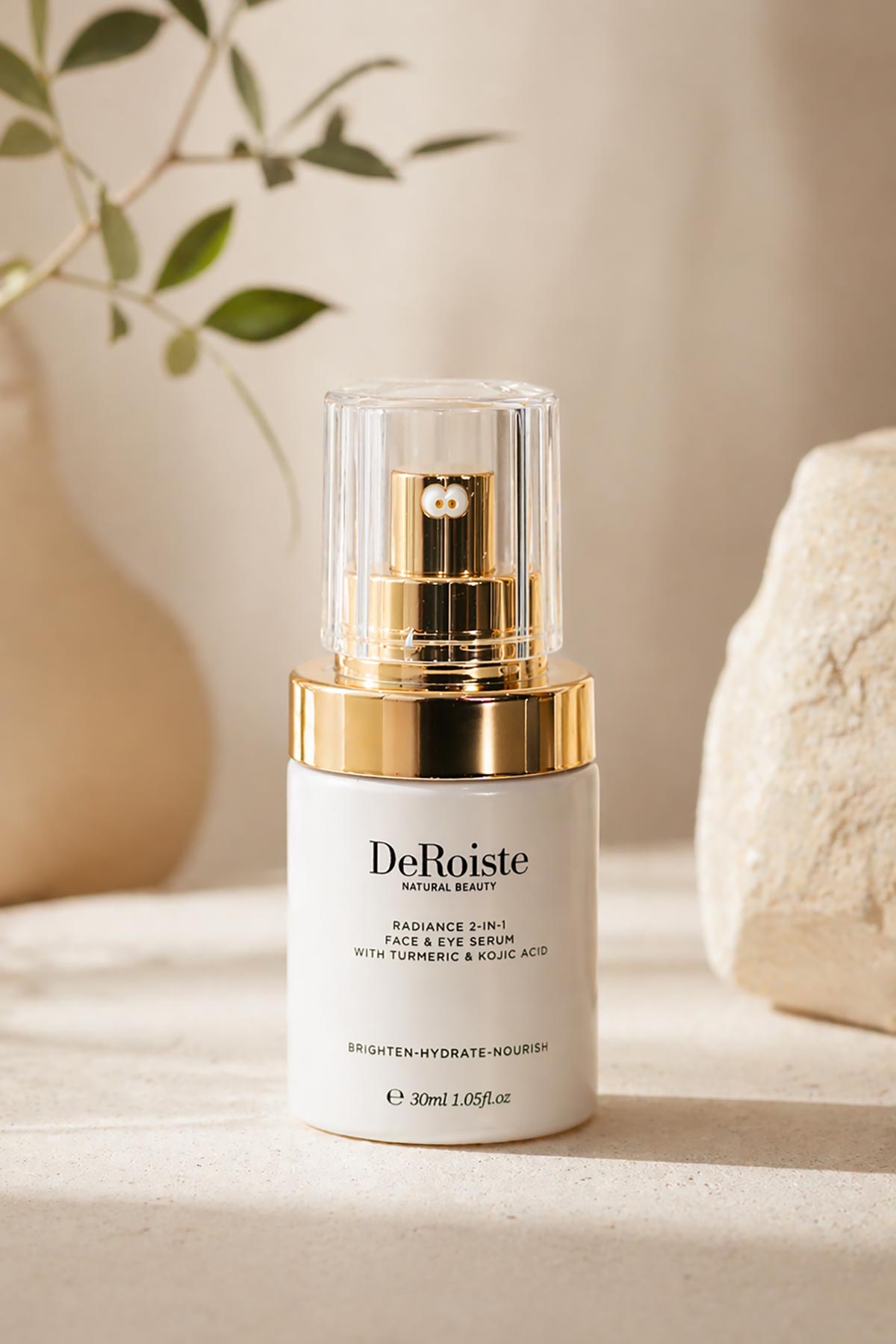 DeRoiste Radiance Face and Eye Serum styled naturally — hyaluronic acid and vitamin C brightening serum for all skin types