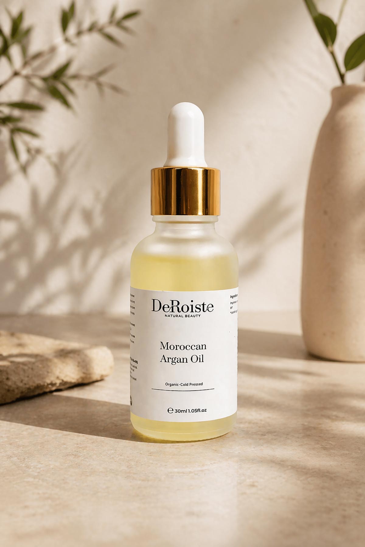 DeRoiste Moroccan Argan Oil 30ml styled with natural botanicals — organic face and hair oil
